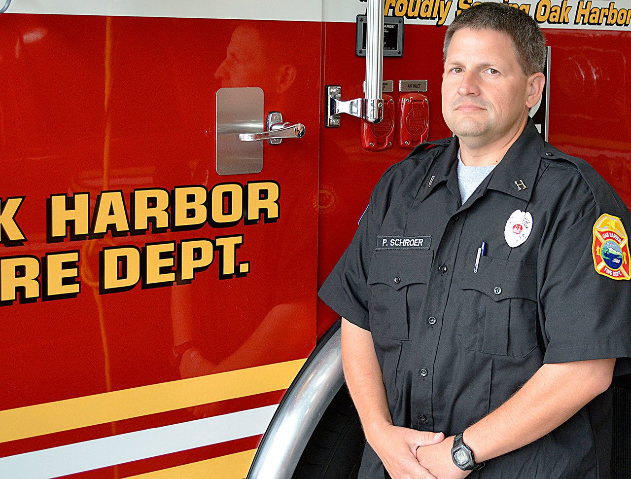 Photo provided                                Capt. Paul Schroer was recognized by the Oak Harbor Fire Department for completing a national education program.