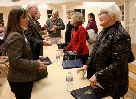 Sen Mary Margaret Haugen discusses issues with Island County Commissioner Helen Price Johnson Thursday night in Coupeville. To Haugen's right