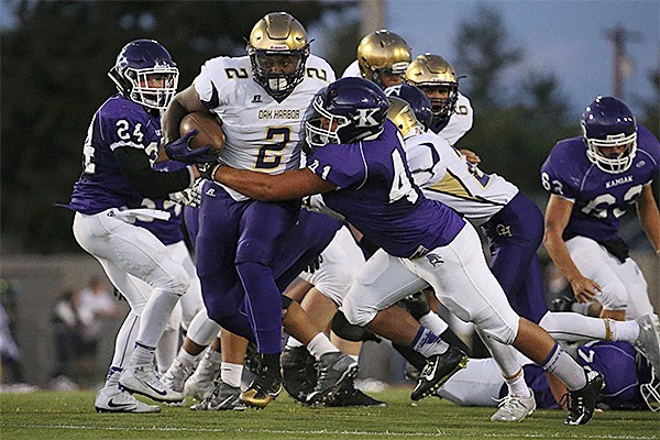 Priceton Lollar plows through the Kamiak defense. Lollar rushed for 275 yards and three touchdowns in the Wildcats' romp.