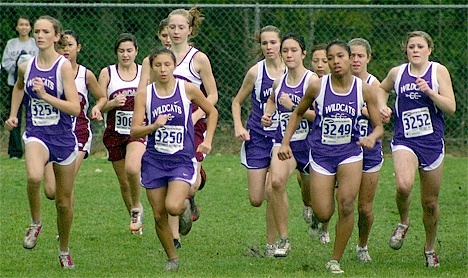 The Oak Harbor girls’ cross country team takes off at the district meet last Saturday: (left to right