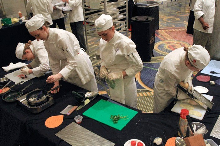 The Oak Harbor culinary team prepares their meal at the national competition in Maryland.