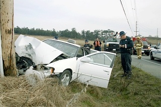 Troopers investigate an accident on Highway 20 in San de Fuca in which a car struck a pole.