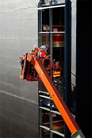 A crew works on the new 12-story $500 million tower being built at Providence Everett Regional Medical Center. The new tower is scheduled to open in June.