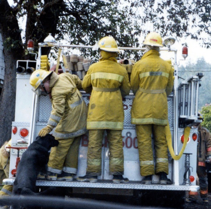 Central Whidbey Fire and Rescue junior firefighters ride on the back of a firetruck sometime in the 1980s. The program is no longer active but fire officials hope to revive it to drum up new volunteers.