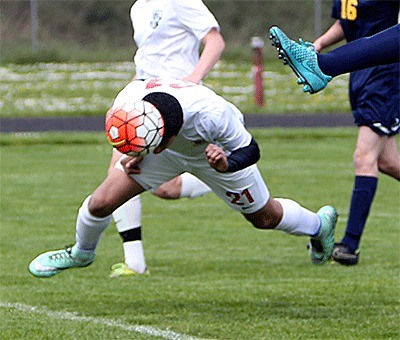 A common sight in Coupeville's 3-0 win over Forks Monday -- Abraham Leyva Elenes scored three goals with headers.