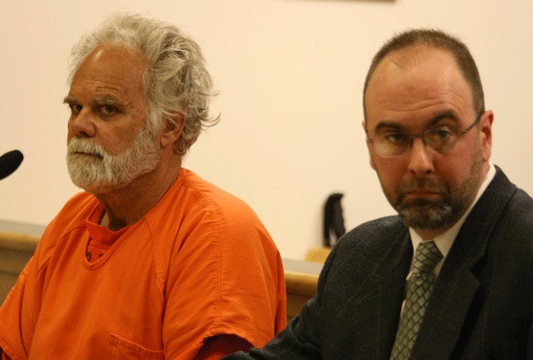 Robert 'Al' Baker appeared in court Monday with attorney Peter Simpson. Baker is charged with killing his wife