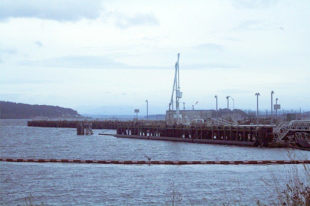 The Navy plans demolish a finger pier in Crescent Harbor and build a 400-foot breakwater to protect the adjacent fuel station. Construction is expected to begin in June.