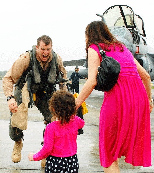 VAQ 133 Lt. Cmdr. Ariel Klein greets his 3-year-old daughter Katherine