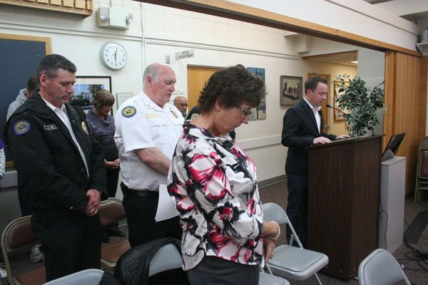 Pastor Michael Hurley of the Life Church gives an invocation at the start of a recent Oak Harbor City Council meeting.