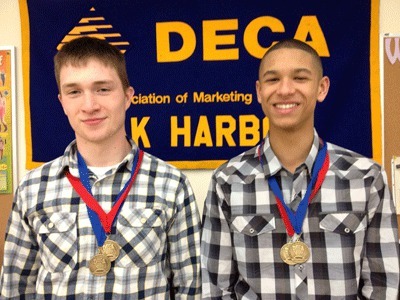 Oak Harbor High School students Josh McVey and Gabe Groenig qualified for the National DECA competition.