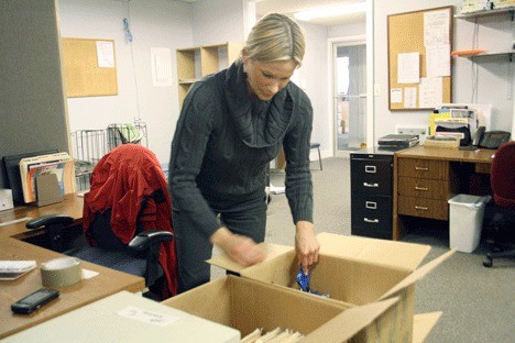 Whidbey News-Times ad rep Sarah Felger packs up for the move to offices in Coupeville. The newspaper’s new office should be open for business next Wednesday. The South Whidbey Record staff will share the space.