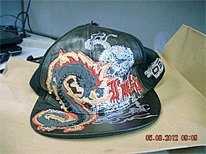 A suspect in a home-invasion robbery left behind this cap.