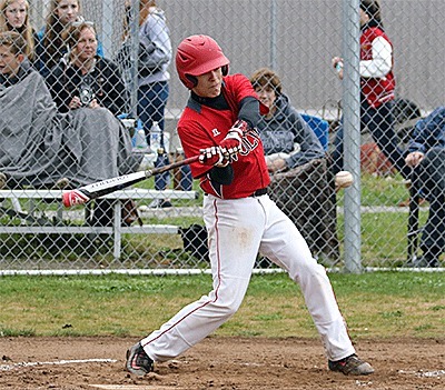 CJ Smith attaches a pitch in Saturday's game with Meridian.