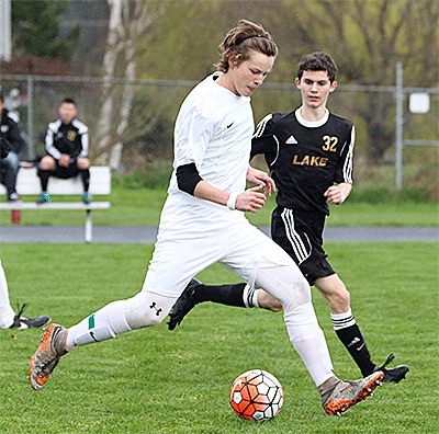 Zane Bundy controls the ball for the Wolves Friday.