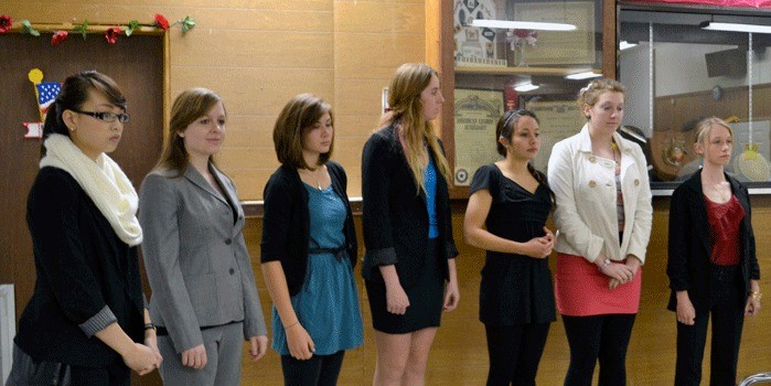 Seven of the eight applicants for a scholarship to attend Evergreen Girls State in June are introduced to members of the American Legion Auxiliary. From the left are Adeline Guina