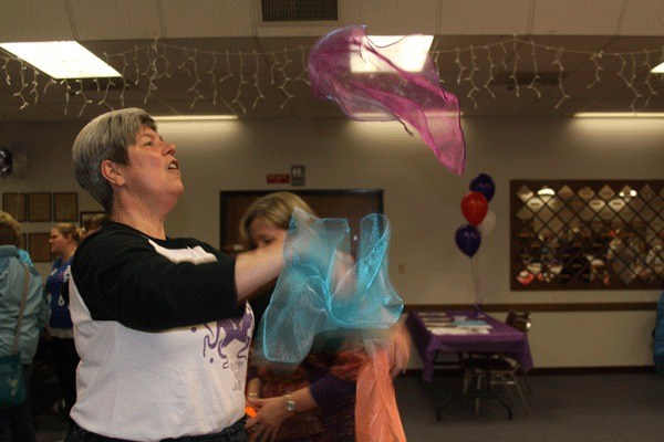 Joy Thompson of the Whidbey Island Jugglers practices her craft during the kickoff rally of the 2014 Relay for Life of Whidbey Island Wednesday night at the Oak Harbor Elks Lodge. This year’s theme for the May 30-31 event is “Carnival of Hope.”