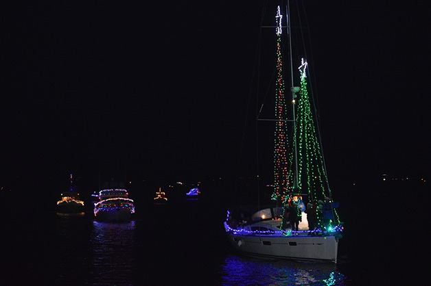 The Oak Harbor Yaht Club Lighted Boat Parade sailed through Penn Cove Saturday evening. Crowds gathered at the Coupeville Wharf to watch the show.