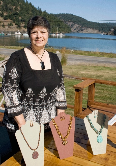 Joanne Deckwa displays a few of her most recent pieces at her home on Cornet Bay.