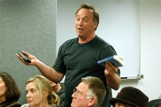 Coupeville preservationist Ken Pickard speaks during a scoping meeting held Tuesday night.