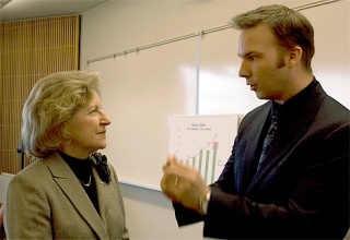 Jason Joiner talks with Rep. Barbara Bailey about business taxes after a town hall-style meeting in Oak Harbor last week.