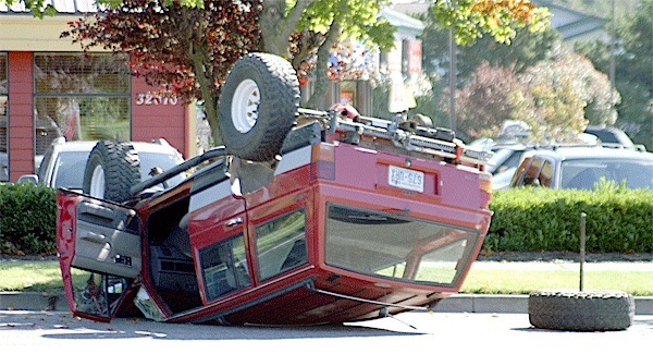 A Jeep Cherokee rolled over on Highway 20 in the middle of Oak Harbor Saturday. The driver and the passenger suffered only minor injuries.