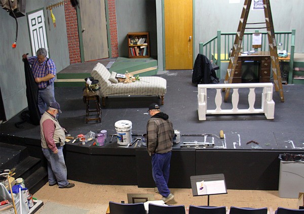 Crew members work on a set at Whidbey Playhouse in Oak Harbor. The Playhouse is celebrating its 50th anniversary this year.