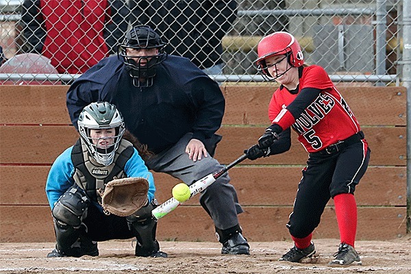 Lauren Rose strokes one of her three hits in Wednesday's wild win over Bellevue Christian.