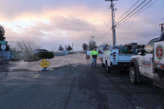 A road near Oak Harbor's wastewater treatment plant partially flooded Thursday morning.