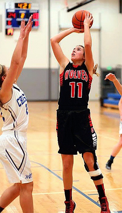 Julia Myers shoots over the defense of Mount Vernon Christian.