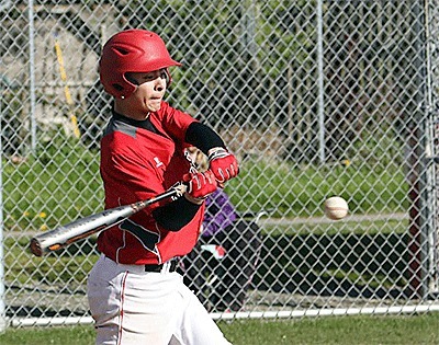 Hunter Smith takes a cut in Coupeville's win over Concrete Wednesday.