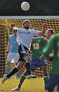 Oak Harbor graduate Greg Wolfe (white jersey) was named the region's top player for community college soccer this season.