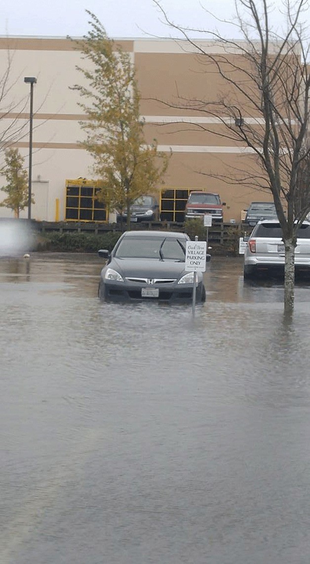 Kim Bolibaugh shared this photo on the Whidbey News-Times Facebook Tuesday of a parking lot next to Home Depot. She said she had to go through high water near Burger King to get to the doctors just to find the parking lot flooded.