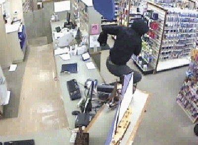 A white male who robbed Linds Pharmacy and Drug in Coupeville vaults over the sales counter on his way out of the store with a backpack full of the drug OxyContin. Officials are still searching for the thief.