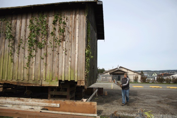 Coupeville Builder Dan Miranda paid to move an old barn one block to the community green behind the Coupeville Public Library.