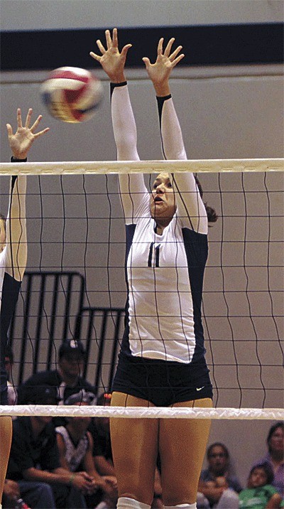 Oak Harbor graduate Clair Thiel blocks for Concordia University. Thiel