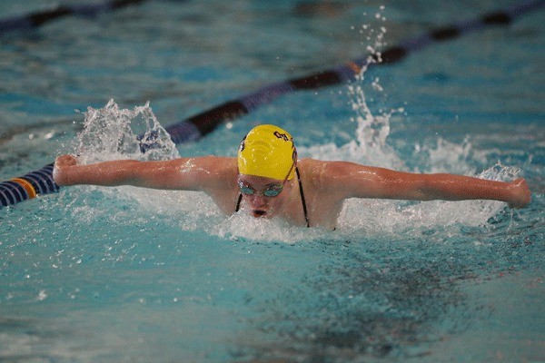 Jillian Pape swims to a win in the 100 butterfly in Monday's meet with Monroe.