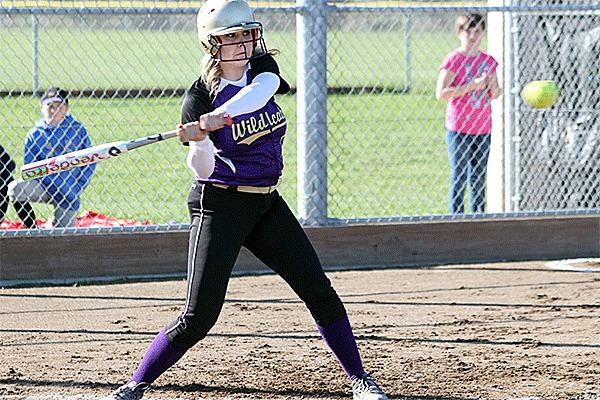 Halle Carpenter takes a cut at a pitch against Arlington Tuesday.