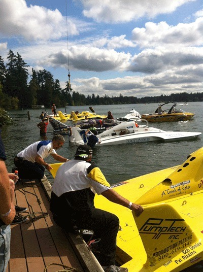 Racers prepare their boats for a hydroplane race. Michelle Curry took the photo while investigating the sport.