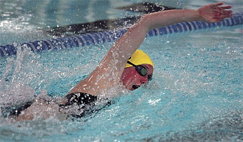 Emily Huffer swims to a state-qualifying time while winning the 50 meter free.