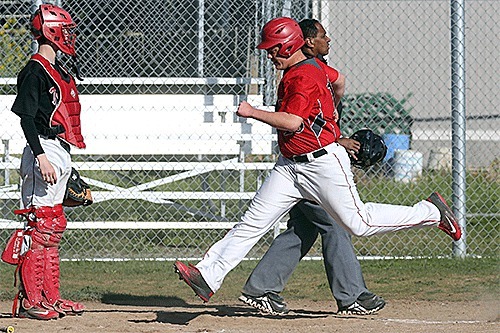 Julian Welling scores for Coupeville in Friday's win.