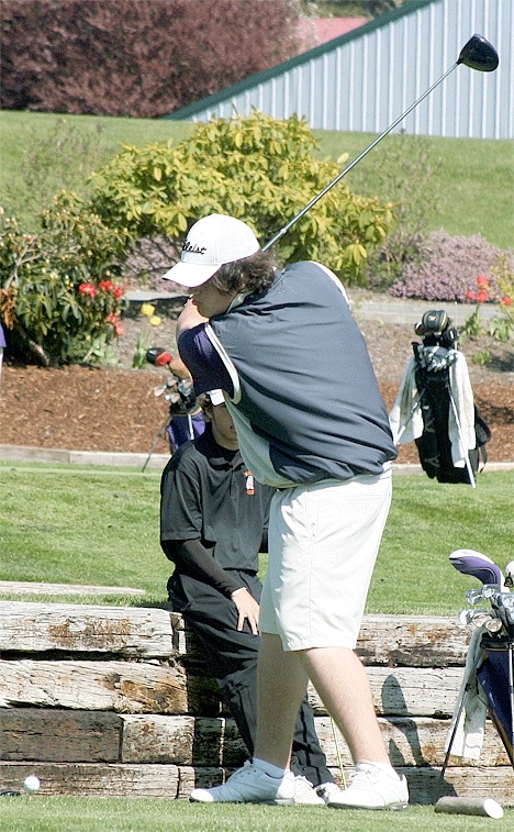 Phil Reedy prepares to drive the ball in a match earlier this season. He finished fifth ijn the WJGA district tournament to qualify for the state championship. Reedy is headed for Skagit Valley College in the fall on a golf scholarship.