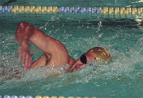 Jacob Jepsen swims to first place in the 200-meter freestyle Monday. He also won the 100 backstroke and swam on two winning relay teams.