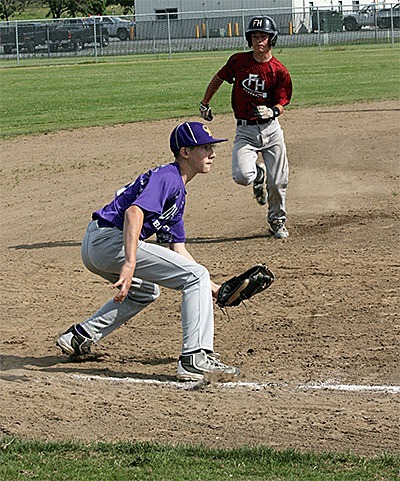 Third baseman Josh Royek waits for a throw as a Friday Harbor runner attempts to steal in Thurday's game.