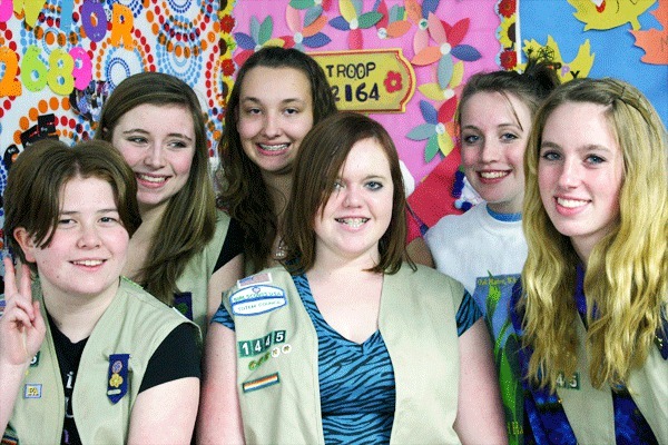 Girl Scout Troop 1445 gathers in their clubhouse on Thursday