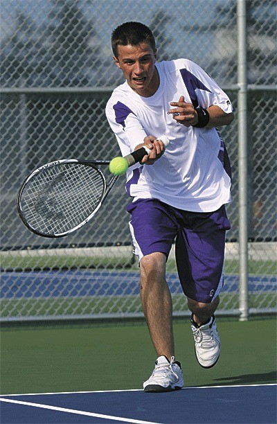 David Kusnick returns a serve in Monday's match.