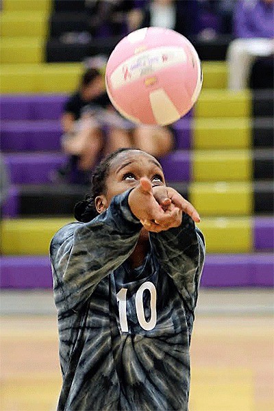 Janae Payne passes for the Wildcats in the win over Everett Thursday. Payne finished with 10 digs and 45 assists.