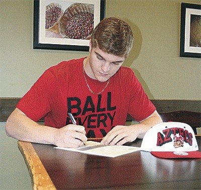 Aaron Boesch signs a letter of intent to play football for San Diego State University.