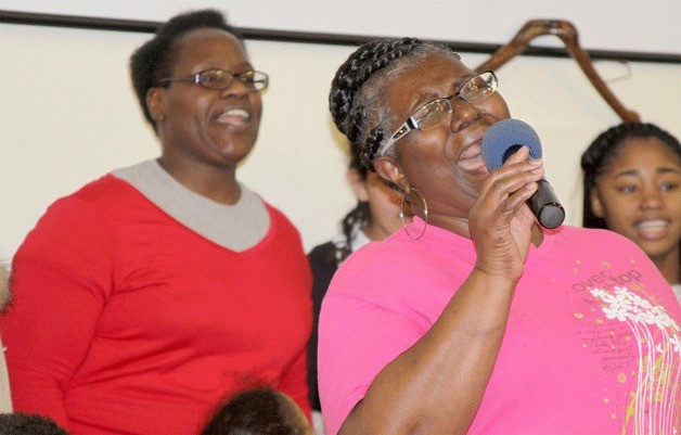 Irene Allen belts out some notes during choir rehearsal at the House of Prayer Monday night. The choir is preparing for the Dr. Martin Luther King Jr. celebrations Friday and Sunday.