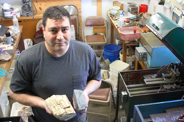 Paul Carter of the Whidbey Island Gem Club holds a chunk of petrified wood and jade in the club’s rock shop. Both can be found on Whidbey Island. The club’s annual rock and gem show is from 9 a.m. to 5 p.m. Saturday and 9 a.m. to 4 p.m. Sunday at the Oak Harbor Senior Center.