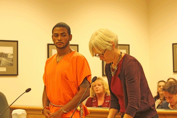 Brian Rayford appears in court at an earlier hearing with his attorney